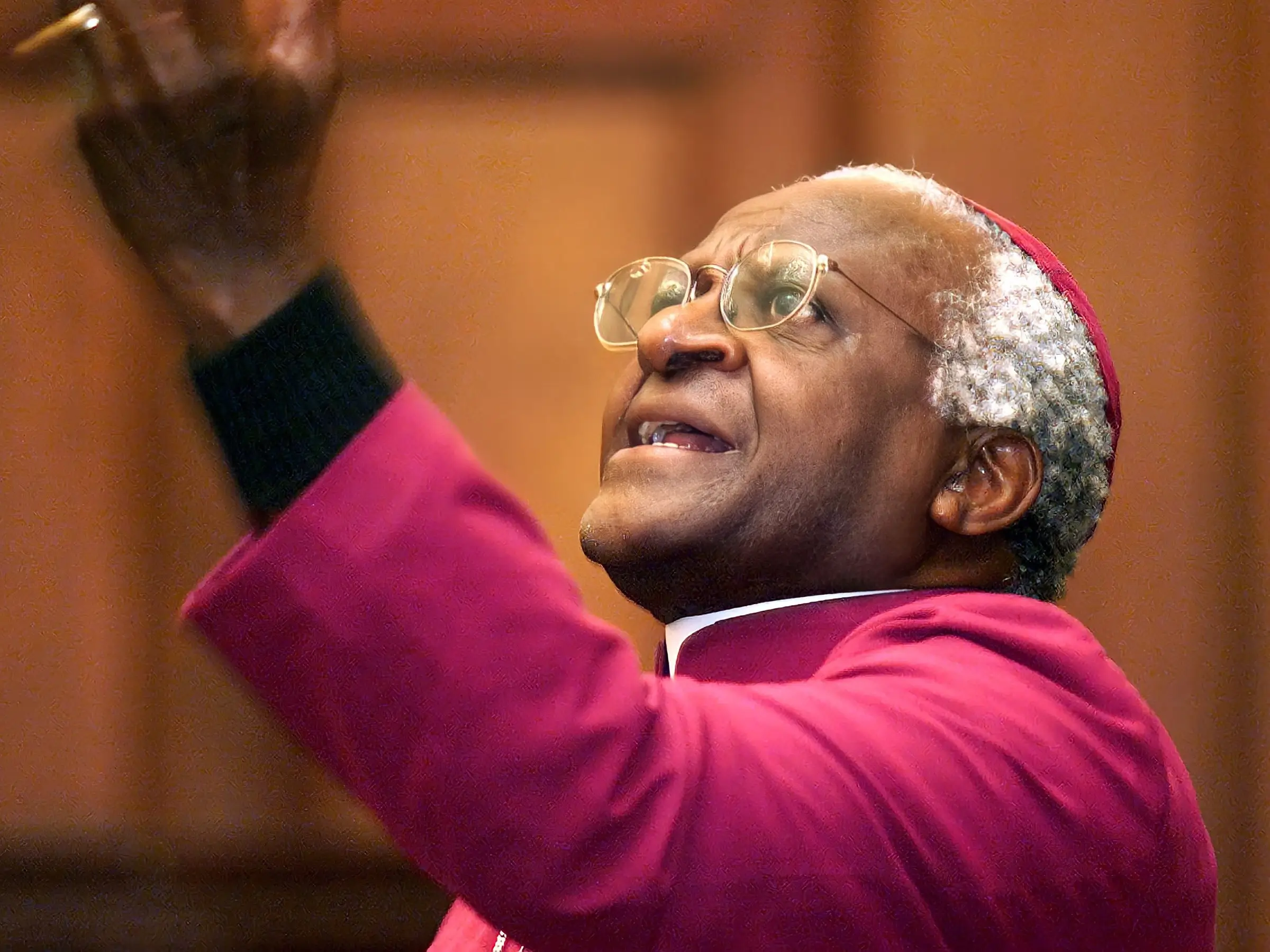 Archbishop Desmond Tutu Praying
